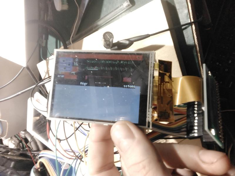 The LCD module shows half a screen with some content mixed with garbage.